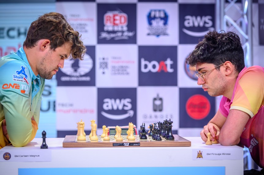 *Magnus Carlsen beaten by clock; the Norwegian loses winning position to Alireza&nbsp;Firouzja*