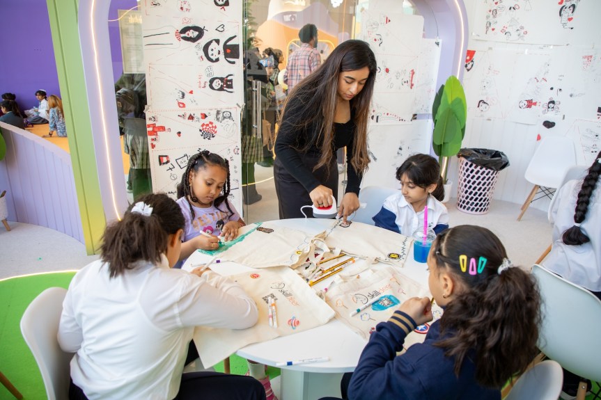 Children create designer tote bags with patchesat 43rdSharjah International Book&nbsp;Fair