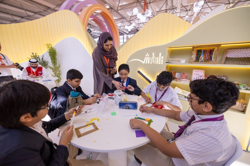 Children learn sustainability by making picture frames from waste materials at the 43rd Sharjah International Book&nbsp;Fair